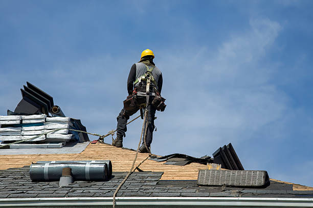 Professional Roof Replacement technician working in Bible School Park, NY